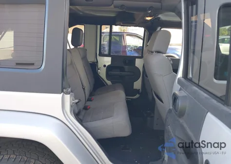 2009 Jeep Wrangler Unlimited Sahara из США, поврежденный, VIN 1J8GA59199L784610